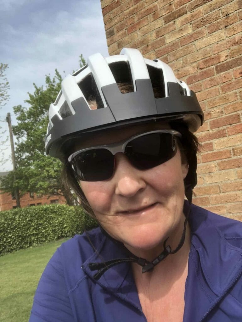 Jo in her bike helmet and sunglasses
