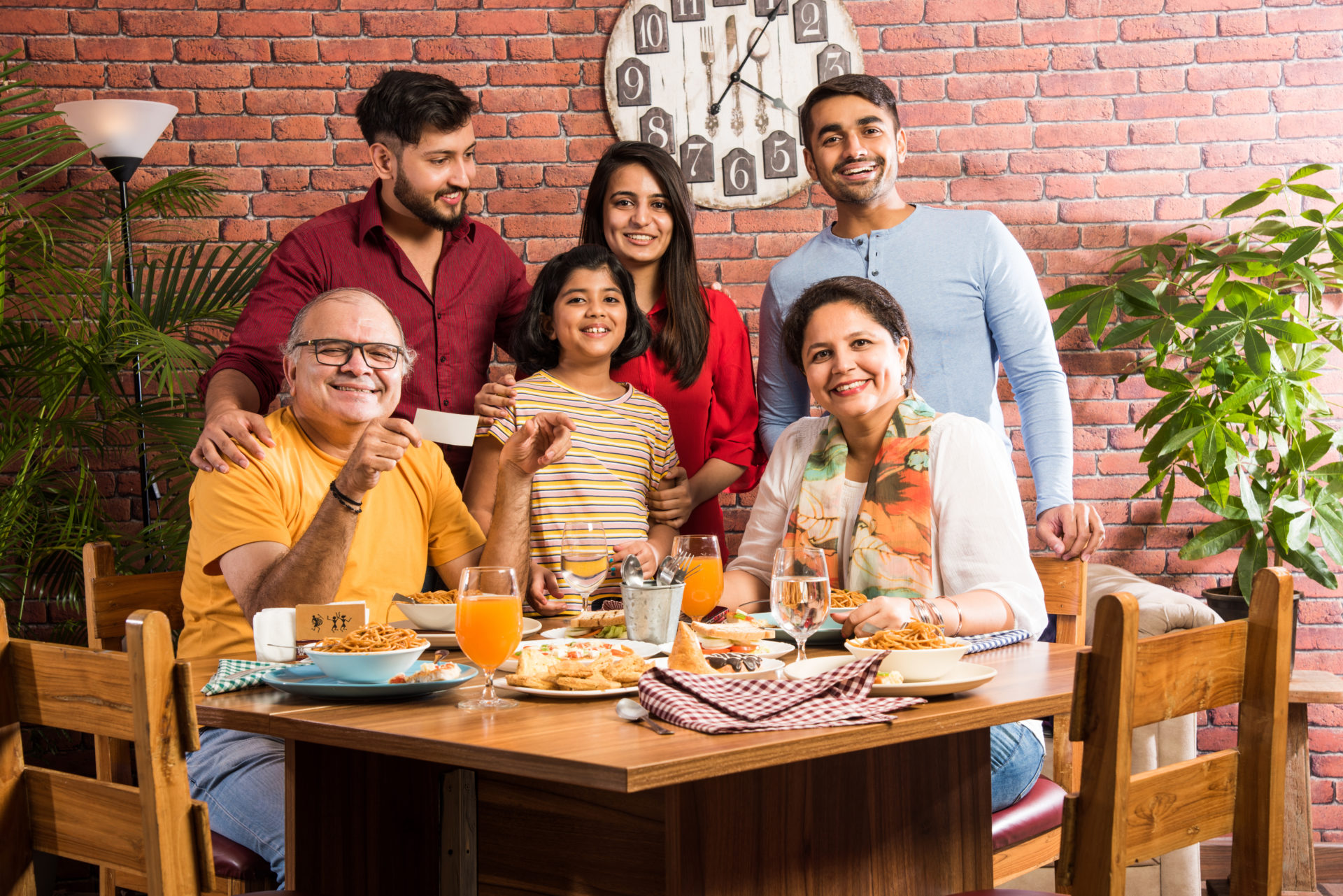 Indian,Multigenerational,Family,Eating,Food,At,Dining,Table,At,Home